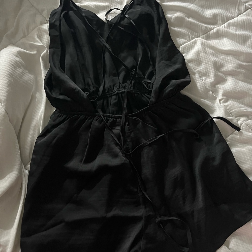 Woman’s small black romper